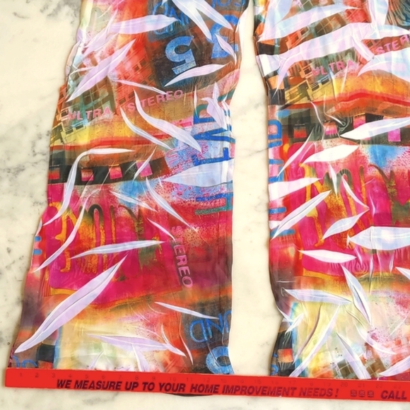 NWOT. Carolina Multi Color Pattern and Words Sheer Wide Leg Pant. - Picture 5 of 6